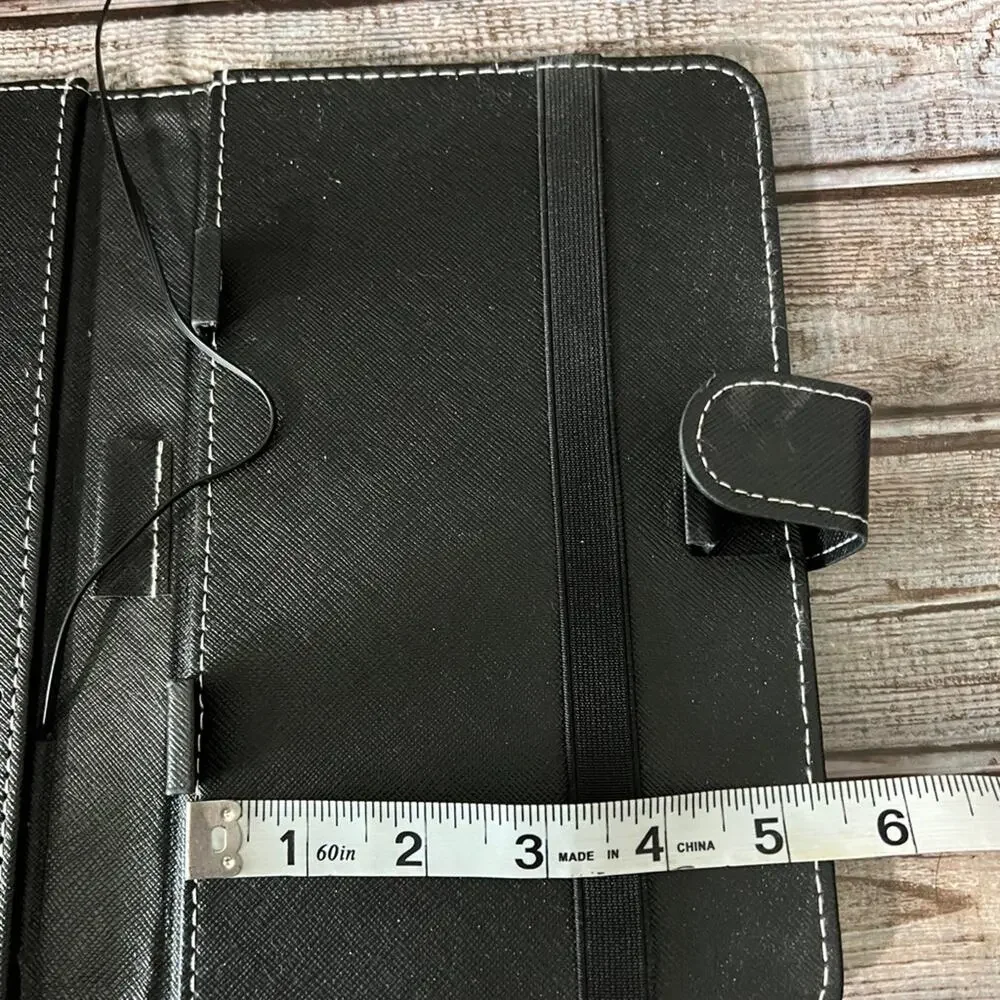 Tablet case and Keyboard. Can hold up to a 9” tablet.